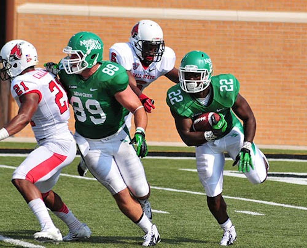 Ball State senior cornerback Jeffery Garrett attempts to chase down North Texas running back Antoinne Jimmerson during the game on Saturday. Ball State’s offense committed a season-high five turnovers during the loss to North Texas. NTDAILY PHOTO RYAN VANCE