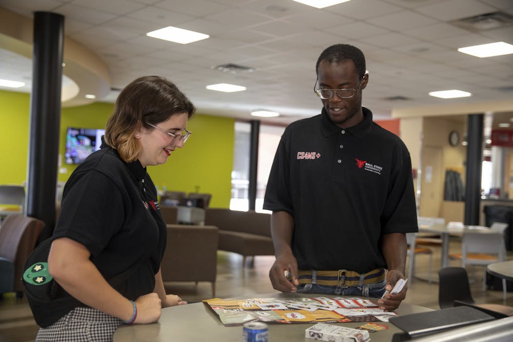 <p>CS4MS+ students Gwyn Hultquist and Brian Walker engage in conversation at a computer science conference in Indianapolis Sept. 16, 2019. CS4MS+ aims to provide students with real-world teaching experience. <strong>Robbie Mehling, Photo Provided</strong></p>