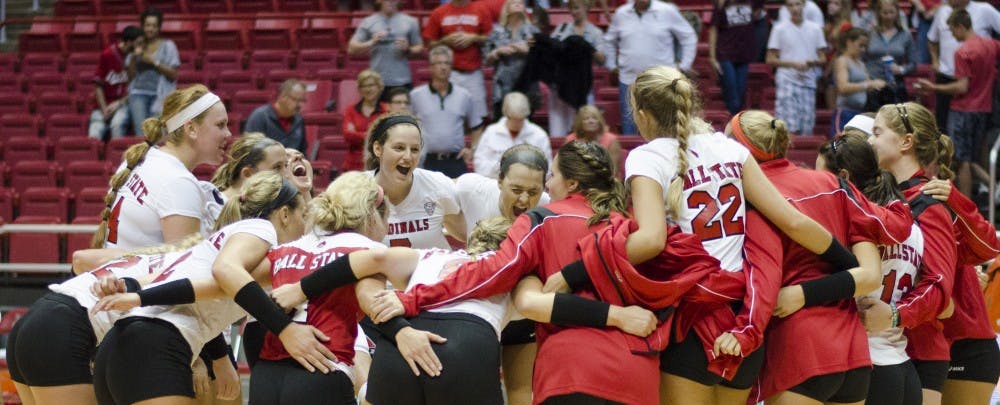 The Ball State women's volleyball huddles up after winning the second match of the Active Ankle Challenge on Aug. 28 at Worthen Arena. Ball State won 3-2. DN PHOTO BREANNA DAUGHERTY
