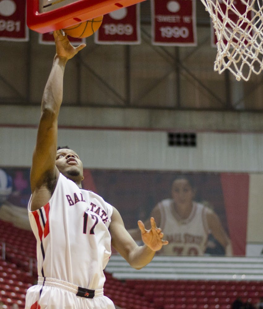 Junior forward Bo Calhoun goes up for a shot during the game against Bowling Green on Feb. 14 at Worthen Arena. DN PHOTO BREANNA DAUGHERTY