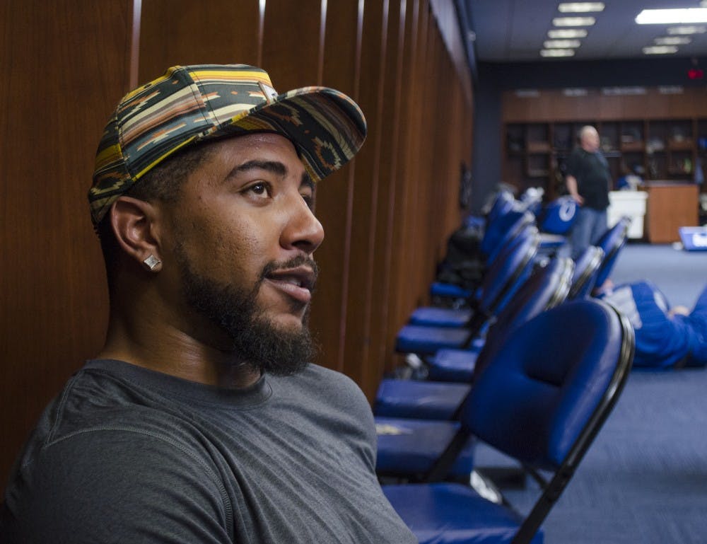 Colts linebacker Jonathan Newsome sits in the locker room at the Colts Complex during rookie camp May 17. Newsome is a former defensive end for Ball State and played for two years after transferring from Ohio State. DN PHOTO BREANNA DAUGHERTY