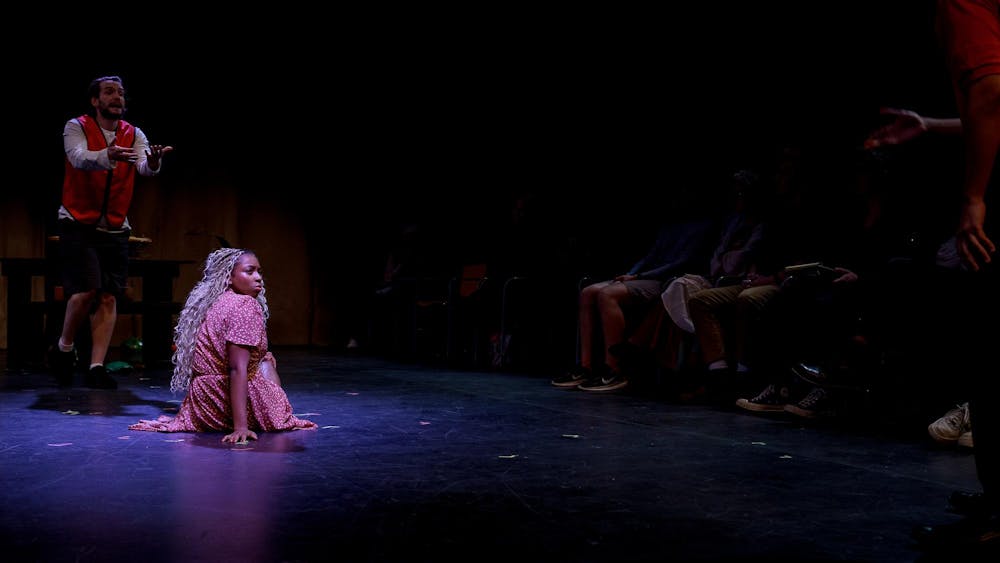 Mya Woodruff and Diego Reed perform a scene together during a rehearsal for “Revolt. She Said. Revolt Again.” Oct. 17 at Strother Theatre. Over four acts, the show writes from a feminist voice that aims to deconstruct language and showcase the struggle of women in a world constructed against them. Kate Tilbury, DN