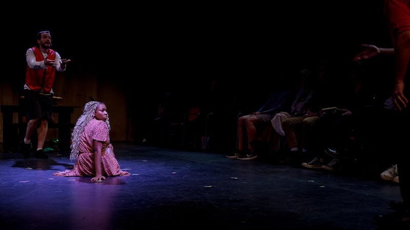 Mya Woodruff and Diego Reed perform a scene together during a rehearsal for “Revolt. She Said. Revolt Again.” Oct. 17 at Strother Theatre. Over four acts, the show writes from a feminist voice that aims to deconstruct language and showcase the struggle of women in a world constructed against them. Kate Tilbury, DN