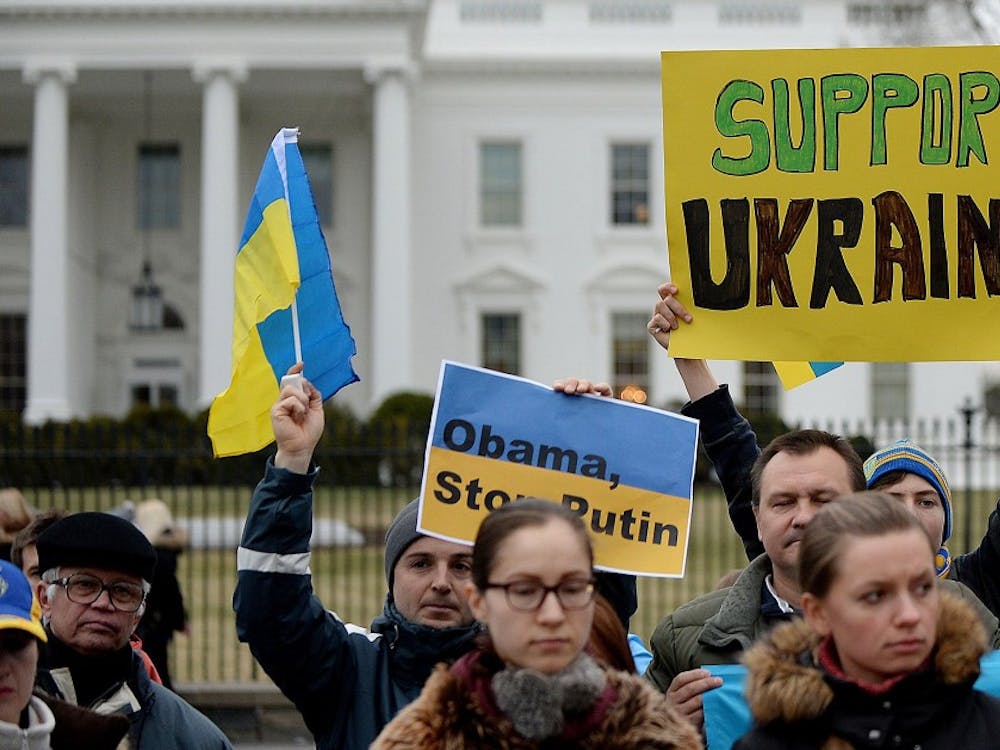 Protesters gather outside the White House to call on the U.S. and European Union to do more to combat Russian aggression in Ukraine's Crimea on Saturday, March 1, 2014, in Washington, D.C. (Olivier Douliery/Abaca Press/MCT)