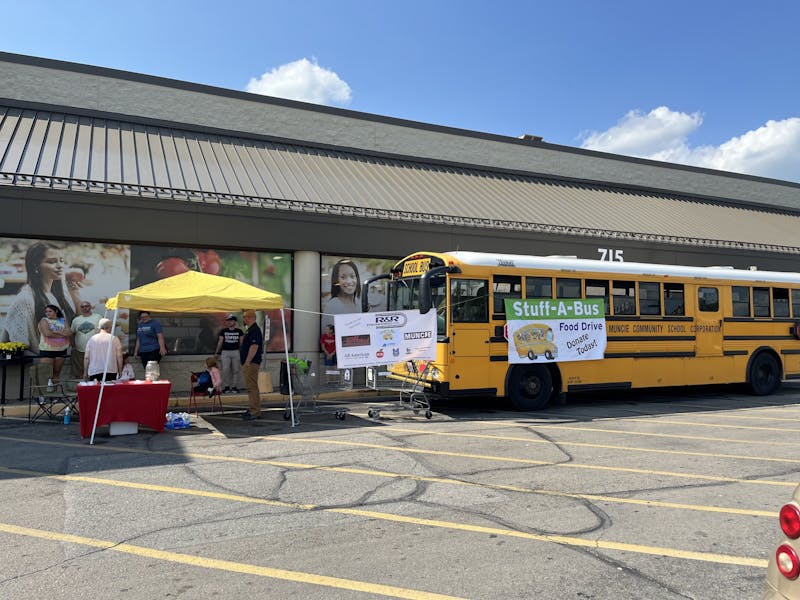 A tent and bus are set up at Payless in Muncie, Indiana, Sept. 17, 2022, for a Hunger Awareness food drive held by the Muncie Soup Kitchen, Panther Pantry and Cardinal Kitchen. The event was from 9 a.m. to 4 p.m. Kyle Smedley, DN