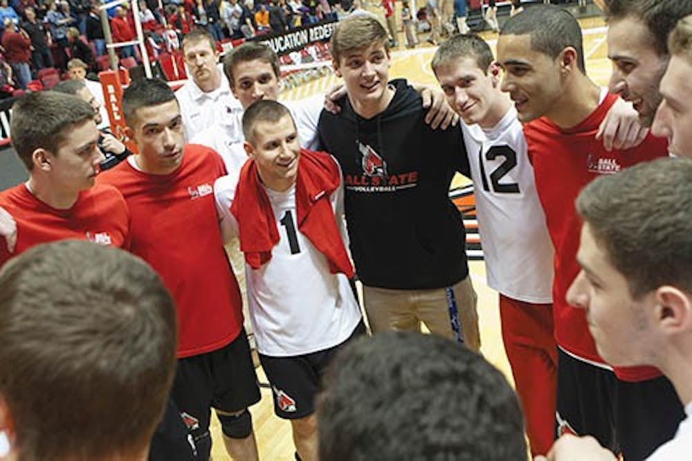 Members of the men’s volleyball team rally together after their win against Loyola on Saturday evening. Ball State’s record rose to 20-5 with the win placing them at third seed in the Midwestern Intercollegiate Volleyball Association. DN PHOTO JORDAN HUFFER
