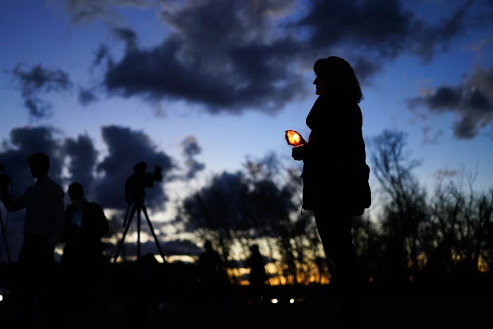 People gather at a vigil in Lisbon Falls, Maine for the victims of last week's Maine shootings, Saturday, October 28, 2023. (AP Photo/Matt Rourke)