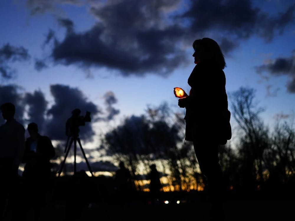 People gather at a vigil in Lisbon Falls, Maine for the victims of last week's Maine shootings, Saturday, October 28, 2023. (AP Photo/Matt Rourke)