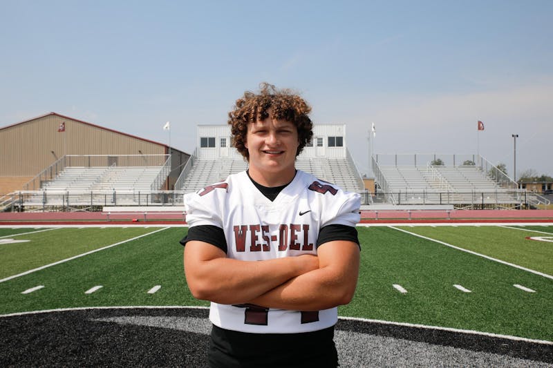 Wes-Del senior Grayson Mealy stands on Paull Parker Field Aug 30 at Wes-Del High School. Mealy plays basketball, football, and baseball. Andrew Berger, DN 
