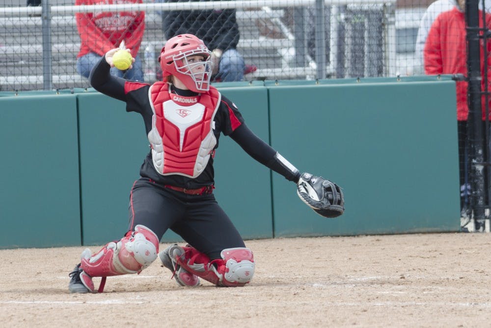 Freshman Sheblie Scamihorn gets ready to throw the ball back to the pitcher during the game against Toledo on April 6 at the Ball State Softball Complex. DN PHOTO BREANNA DAUGHERTY