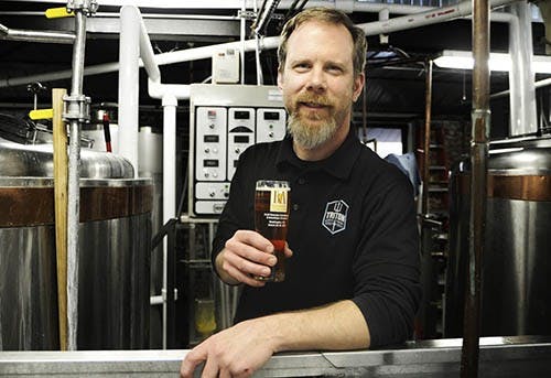 Jon Lang, one of Triton’s co-owners and head brewer, has spent the last year and a half enjoying complete creative control over the beers he makes. He founded Triton Brewing Co., after leaving his first full-time brewing job at Barley Island in Noblesville, Ind. DN PHOTO TYLER STEWART