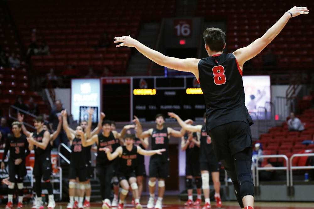 Second-year middle blocker Vanis Buckholz celebrates getting an ace in a game against BYU Feb. 4 at Worthen Arena. Buckholz had three aces during the game. Amber Pietz, DN