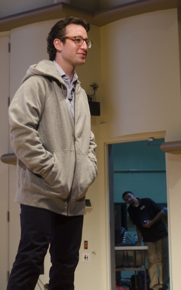 Eric Kuhn, a speaker Wednesday at Pruis Hall, wears Greg Carbo