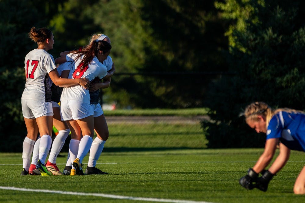 Ball State’s soccer team celebrates after Tatiana Mason scored a goal putting the Cardinals in the lead during the second half of the game against the University of Nebraska-Omaha on Friday, Sept. 14, 2018 at Briner Sports Complex. Ball State went on to defeat Omaha 3 to 1 with all goals being scored in the second half of the game. Eric Pritchett,DN