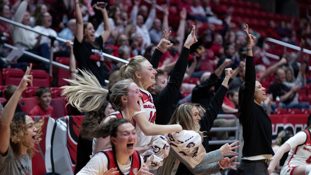 Members of the Ball State Women's Basketball team celebrate after senior Blake Smith hits a three-pointer in their game against Eastern Michigan University Mar. 5 at Worthen Arena. The Cardinals rotated their entire bench into the line up on Senior Night. Eli Houser, DN