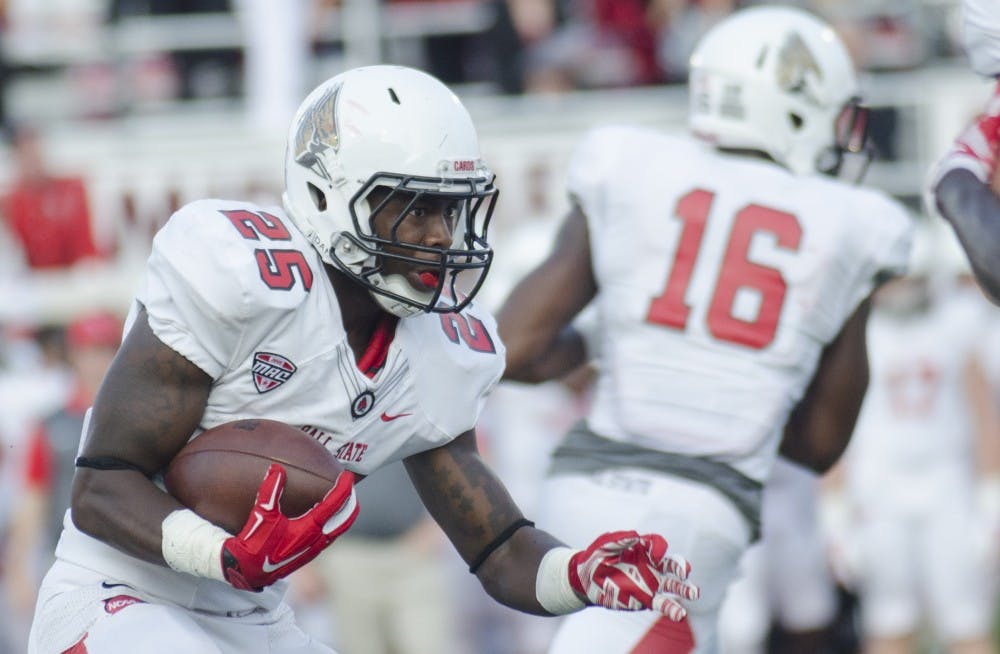Sophomore running back Darian Green runs the ball during the game against Virginia Military Institute on Sept. 3 at Scheumann Stadium. DN PHOTO BREANNA DAUGHERTY
