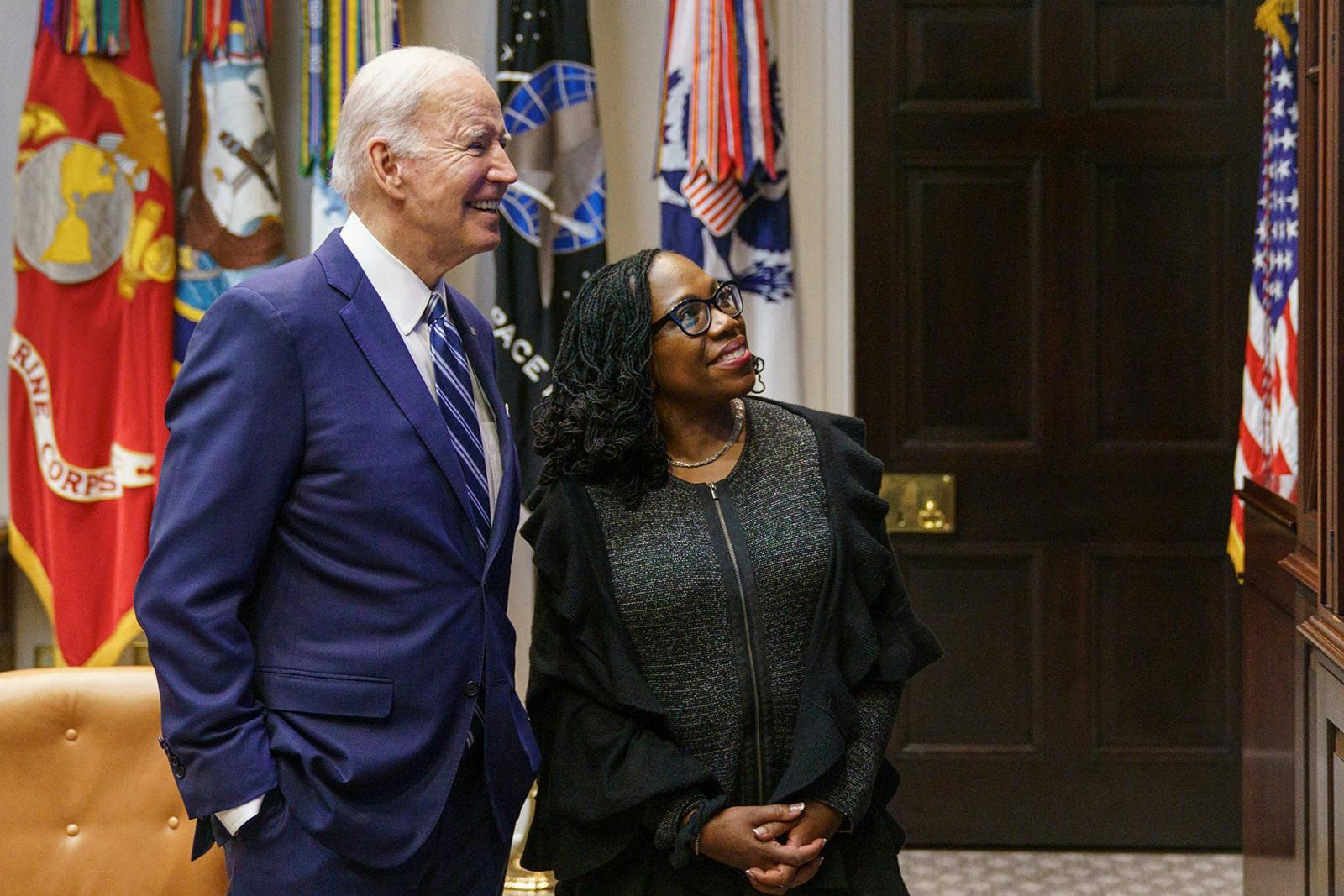US President Joe Biden and Judge Ketanji Brown Jackson watch the Senate vote on her nomination to be an associate justice on the US Supreme Court, from the Roosevelt Room of the White House in Washington, DC on April 7, 2022. (Mandel Ngan/AFP via Getty Images/TNS)
