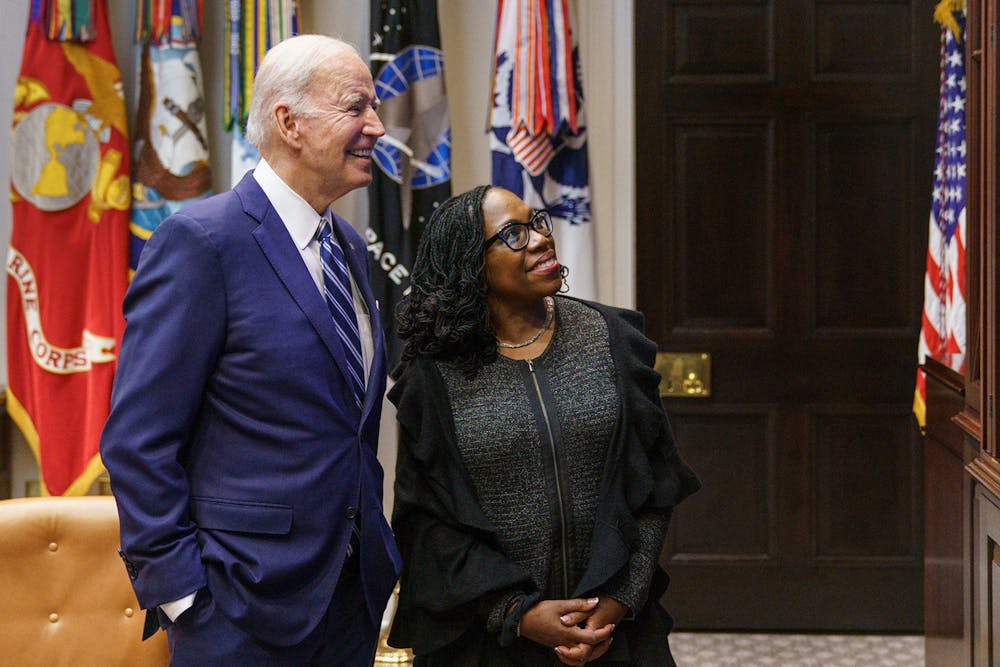 US President Joe Biden and Judge Ketanji Brown Jackson watch the Senate vote on her nomination to be an associate justice on the US Supreme Court, from the Roosevelt Room of the White House in Washington, DC on April 7, 2022. (Mandel Ngan/AFP via Getty Images/TNS)