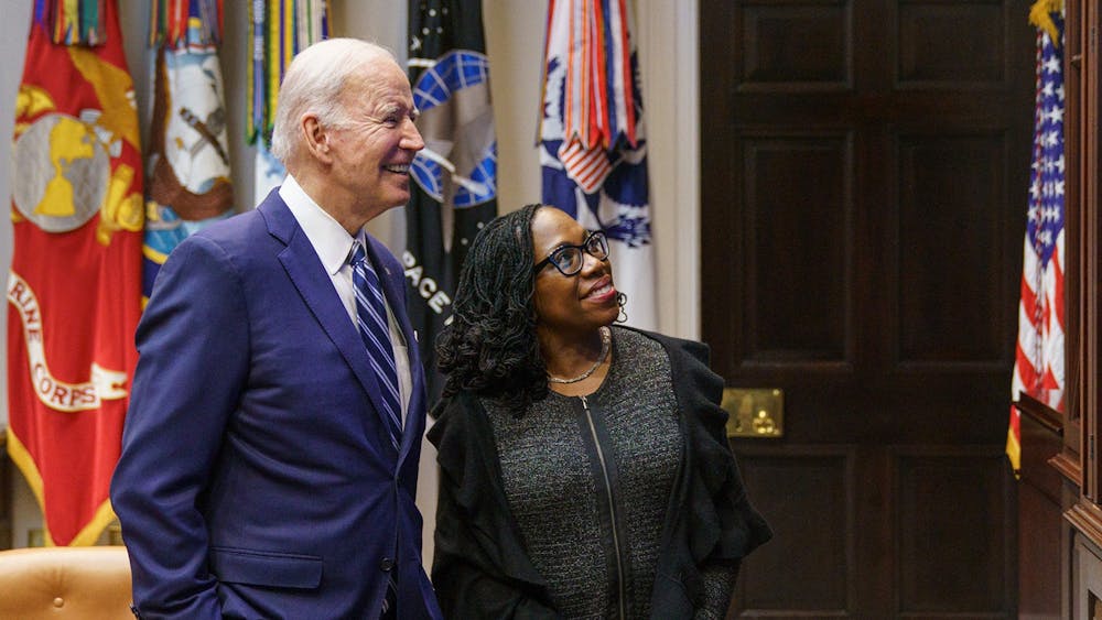 US President Joe Biden and Judge Ketanji Brown Jackson watch the Senate vote on her nomination to be an associate justice on the US Supreme Court, from the Roosevelt Room of the White House in Washington, DC on April 7, 2022. (Mandel Ngan/AFP via Getty Images/TNS)