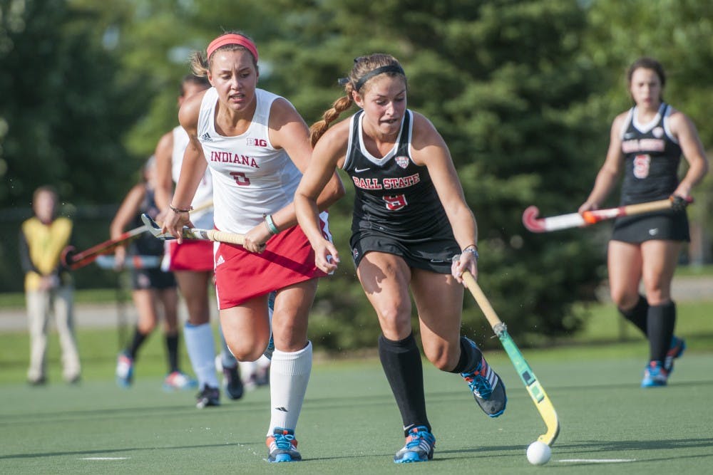 Senior midfielder Tori Widrick pushes past Indiana during the game against Indiana University on on Sept. 17 at the BSU Turf field. DN PHOTO JONATHAN MIKSANEK