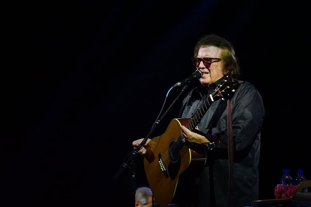 During a break in between songs, singer-songwriter Don McLean chats with the audience that gathered at the Brown Family Amphitheater in Muncie, Ind Sept. 2. The amphitheater was created through a collaboration between Ball State University and the City of Muncie. Kate Farr, DN