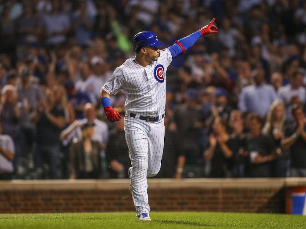 The Chicago Cubs' Willson Contreras points toward the stands after hitting a solo home run during the second inning against the Seattle Mariners at Wrigley Field in Chicago on Tuesday, Sept. 3, 2019. (Armando L. Sanchez/Chicago Tribune/TNS)