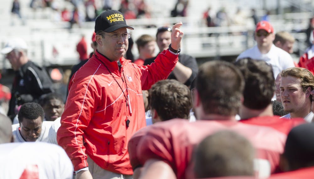Head coach Pete Lembo talks to the football team after the spring game on April 19 at Scheumann Stadium. DN PHOTO BREANNA DAUGHERTY 
