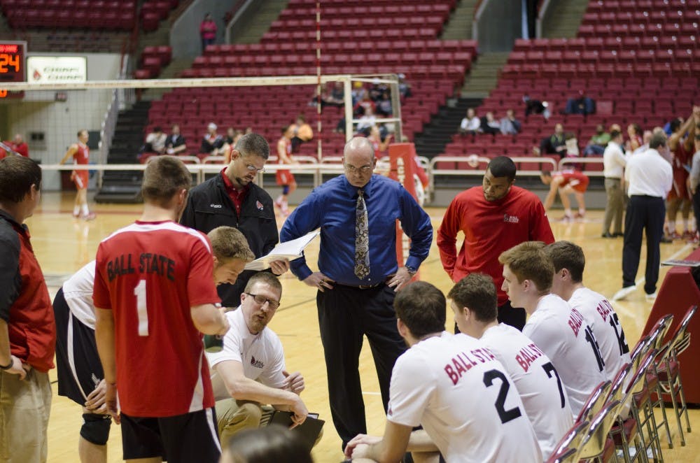 Head coach Joel Walton talks to his team during a timeout in the match against Ohio State on March 23 at Worthen Arena. The men