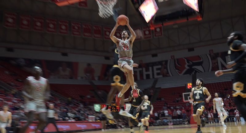 Ball State’s Jeremiah Hernandez dunks on a fast break.