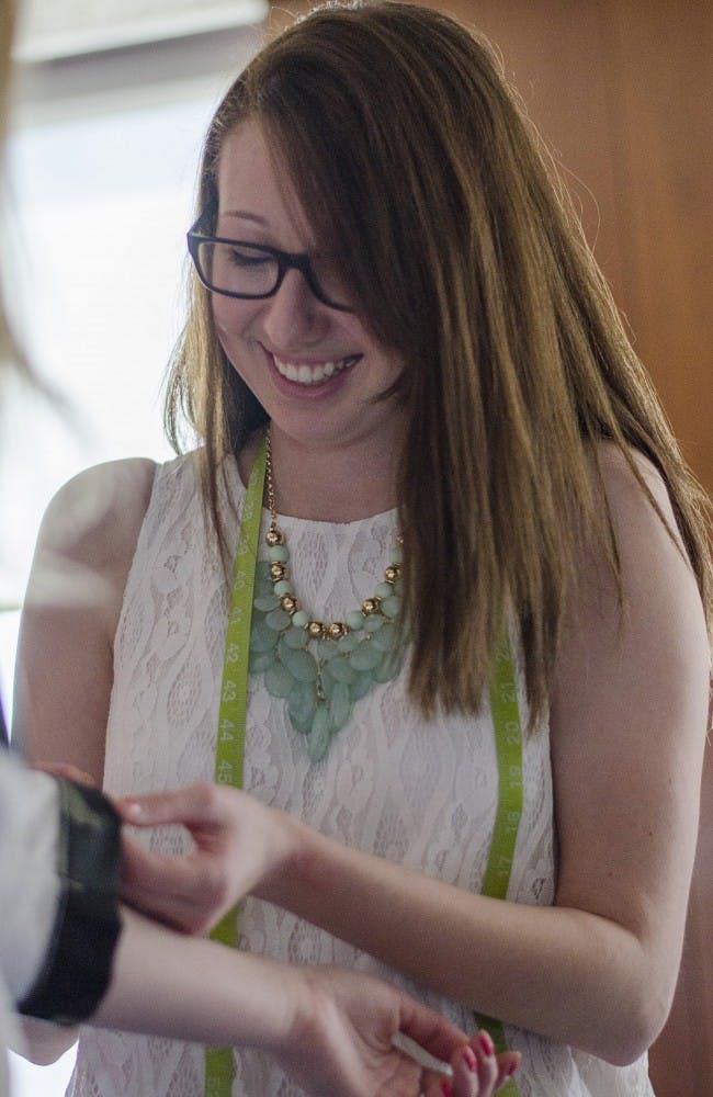 About a month ago Castrogiovanni realized the fashion show was coming up. She then decided to make the black mini skirt to go along with the blouse. When she made the skirt she didn't have a pattern, but rather a general idea of what she wanted.