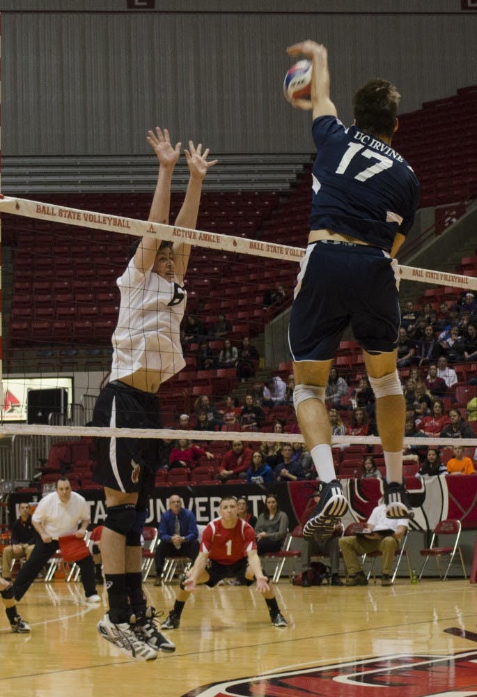 Freshman outside attacker Brendan Surane jumps up to block the ball from UC Irvine player Zach La Cavera at Worthen Arena on Jan. 4. Surane had six kills and six errors in his career debut. DN PHOTO BREANNA DAUGHERTY
