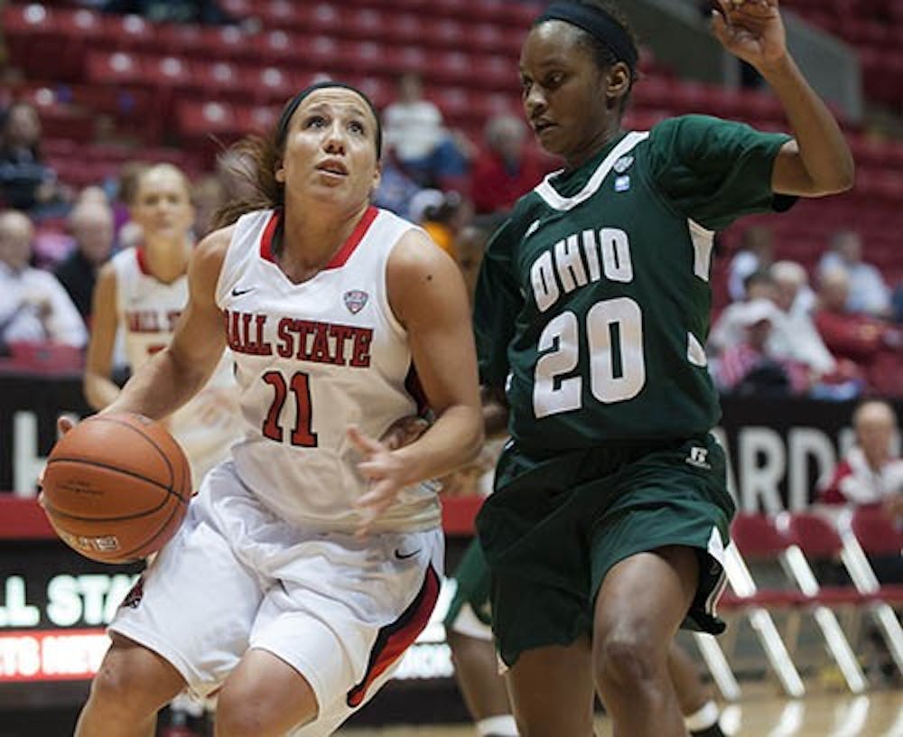 Junior guard Brandy Woody pushes towards the paint for a layup attempt against Ohio University Jan. 26 at Worthen Arena. Woody was the lead scorer for the Cardinals in their victory over the Bobcats. DN PHOTO JONATHAN MIKSANEK