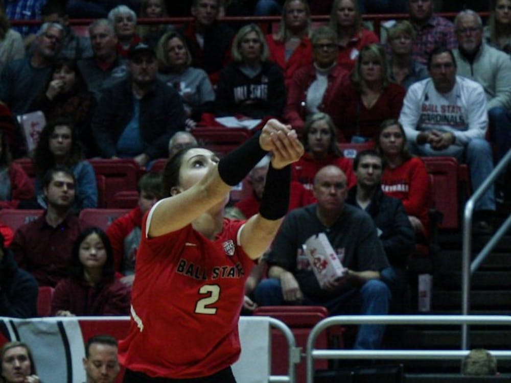 Junior defensive specialist Kate Avila bumps the ball as it comes over the net at the Ball State women's volleyball match versus Akron University Nov.10, 2018 at John E. Worthen Arena. Avila had two assists at the end of the game. Tailiyah Johnson,DN