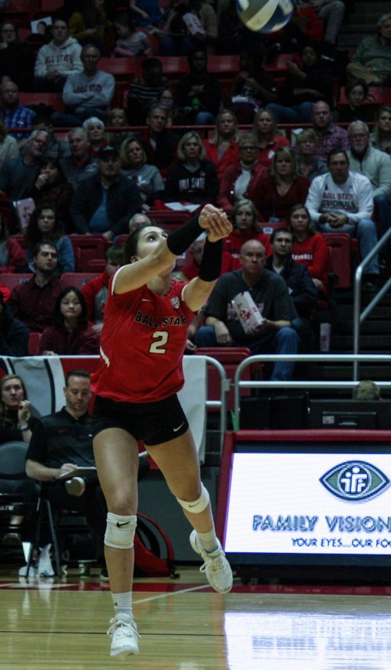 Junior defensive specialist Kate Avila bumps the ball as it comes over the net at the Ball State women's volleyball match versus Akron University Nov.10, 2018 at John E. Worthen Arena. Avila had two assists at the end of the game. Tailiyah Johnson,DN