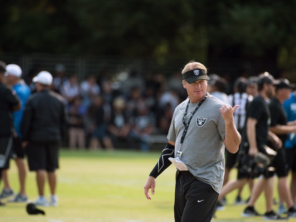 Former Las Vegas Raiders head coach Jon Gruden leads a practice August 7, 2018. Gruden resigned Oct. 11 after the National Football League (NFL) investigation into the Washington Football Team for workplace misconduct found Gruden used homophobic, racist and misogynistic slurs in emails as recently as 2018. Gruden was in his fourth year with the Raiders. Louis Briscese/ US Air Force
