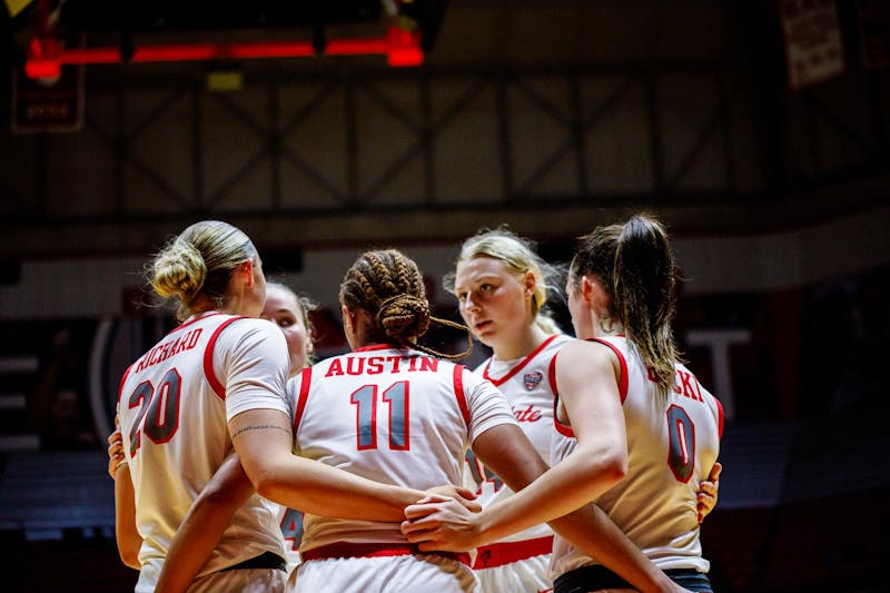 Team embraces Senior Guard Lachelle Austin following a fall in the game against IU Indy Nov. 8 at Worthen Arena. Austin scored 14 points for this game. Kate Tilbury, DN