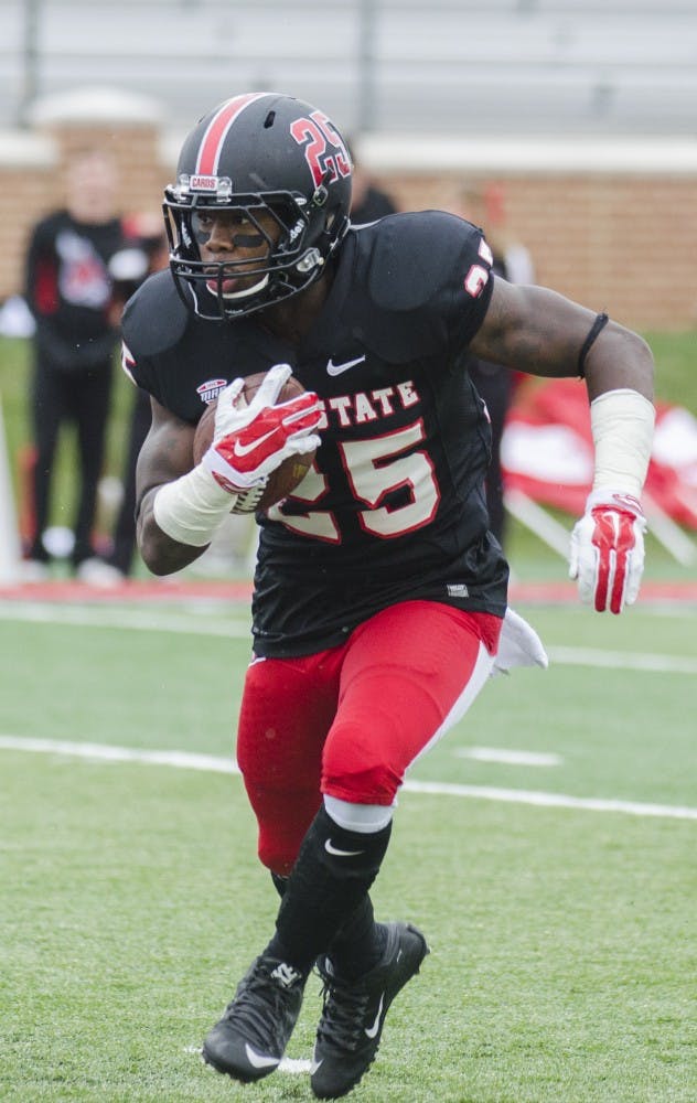 Sophomore running back Darian Green attempts to run down the field during the game against the University of Massachusetts on Oct. 31 at Scheumann Stadium. DN PHOTO BREANNA DAUGHERTY