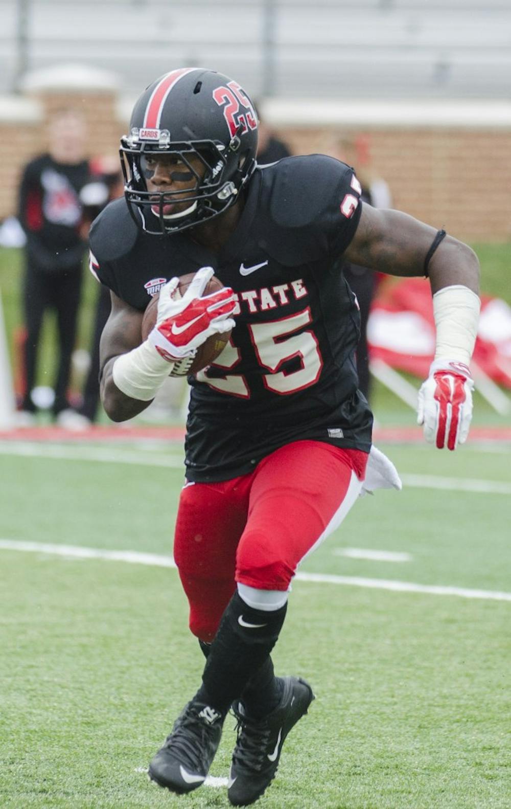 Sophomore running back Darian Green attempts to run down the field during the game against the University of Massachusetts on Oct. 31 at Scheumann Stadium. DN PHOTO BREANNA DAUGHERTY