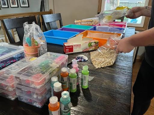 Riedel prepares to dye chickpeas for her sensory kits.