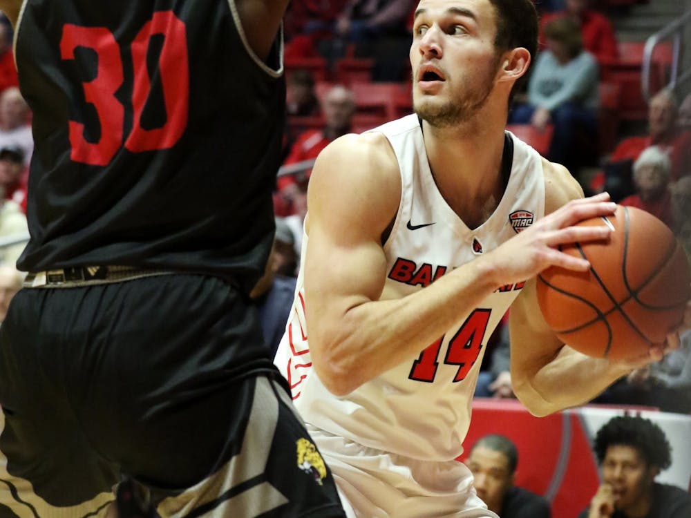 Ball State senior forward Kyle Mallers looks for an opening while being guarded by IUPUI graduate forward Zo Tyson during the Cardinals' game against the Jaguars Dec. 7, 2019, at John E. Worthen Arena. Mallers scored 11 points. Paige Grider, DN