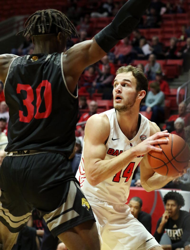 Ball State senior forward Kyle Mallers looks for an opening while being guarded by IUPUI graduate forward Zo Tyson during the Cardinals' game against the Jaguars Dec. 7, 2019, at John E. Worthen Arena. Mallers scored 11 points. Paige Grider, DN