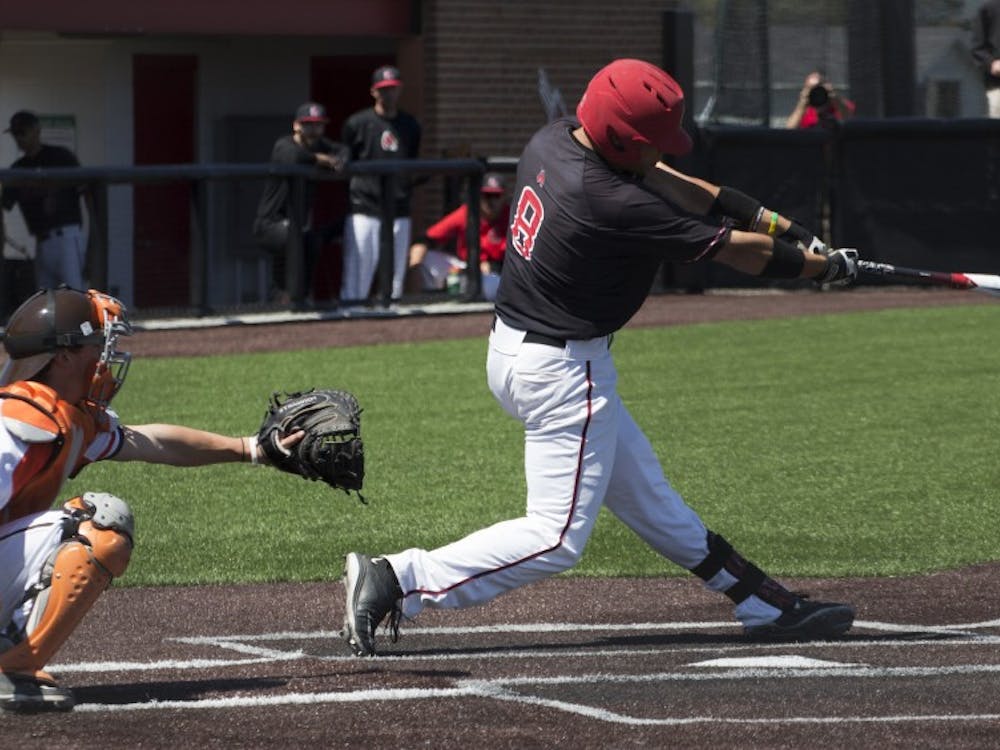 Alex Call, a junior outfielder for the Ball State Cardinals, attempts to hit the ball during the game against Bowling Green on April 23. DN PHOTO GRACE RAMEY