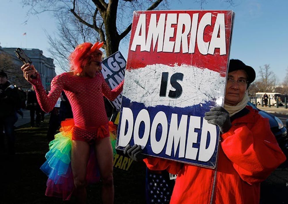 Qween Amar, of Orlando, Florida dances as demonstrators gather as arguments are heard on California&apos;s Proposition 8 concerning gay marriage, outside the U.S. Supreme Court in Washington, D.C., Tuesday, March 26, 2013. (Molly Riley/MCT)