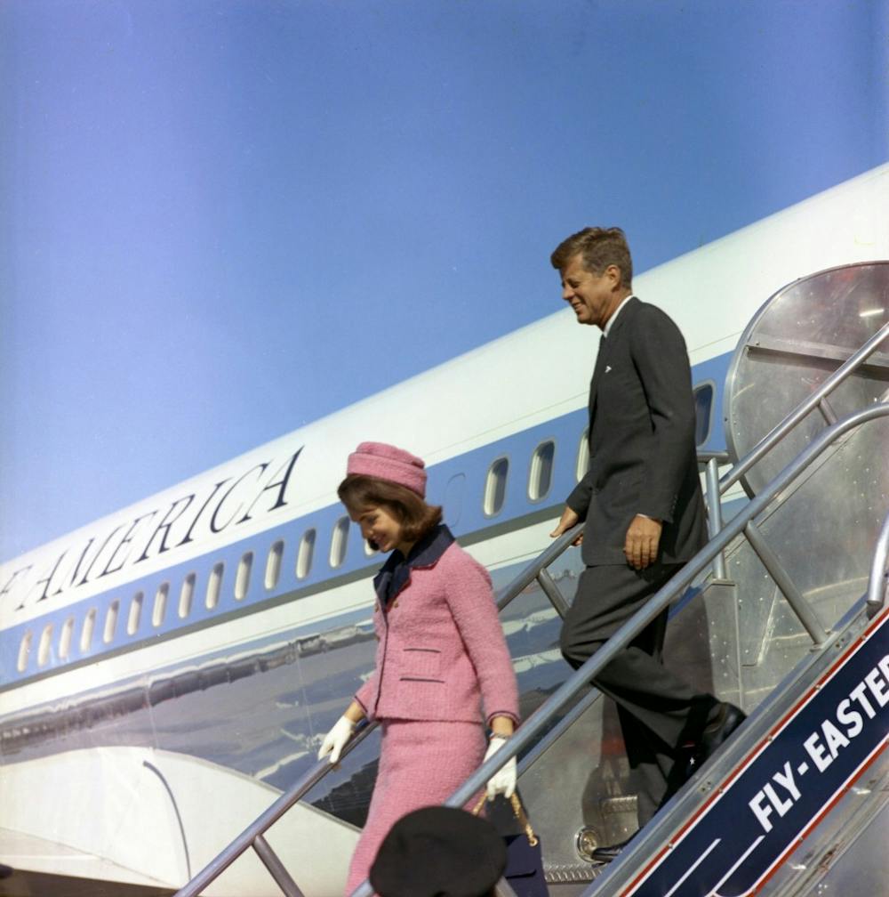 President John F. Kennedy and first lady Jacqueline Kennedy descend the stairs from Air Force One on Nov. 22, 1963, at Love Field in Dallas. Friday is the 50th anniversary of the assassination of Kennedy. MCT PHOTO