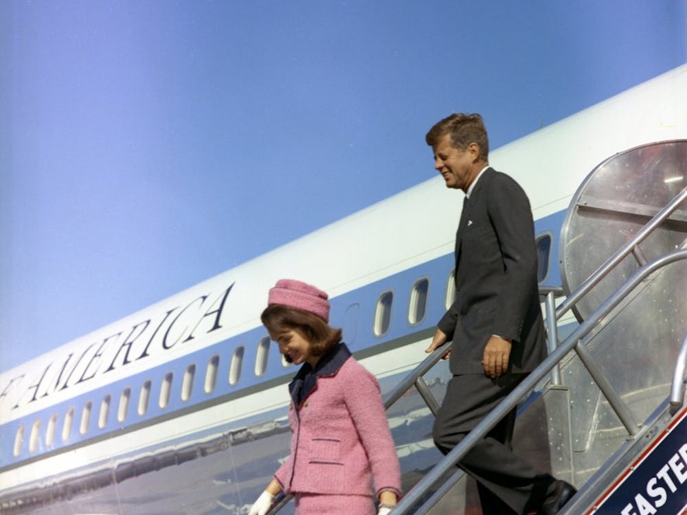 President John F. Kennedy and first lady Jacqueline Kennedy descend the stairs from Air Force One on Nov. 22, 1963, at Love Field in Dallas. Friday is the 50th anniversary of the assassination of Kennedy. MCT PHOTO