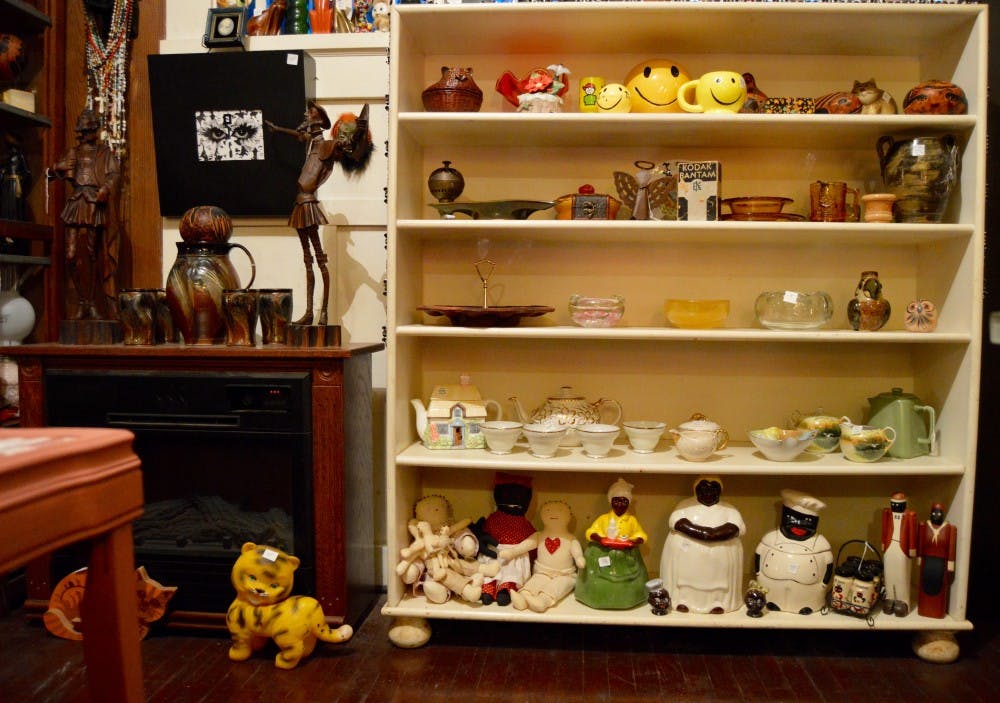 The Vintage Thrift Art & Antiques had their grand opening three weeks in the owners' living room of their home. The shop includes vintage clothes, artwork and collectables from different time periods. DN PHOTO REBECCA KIZER