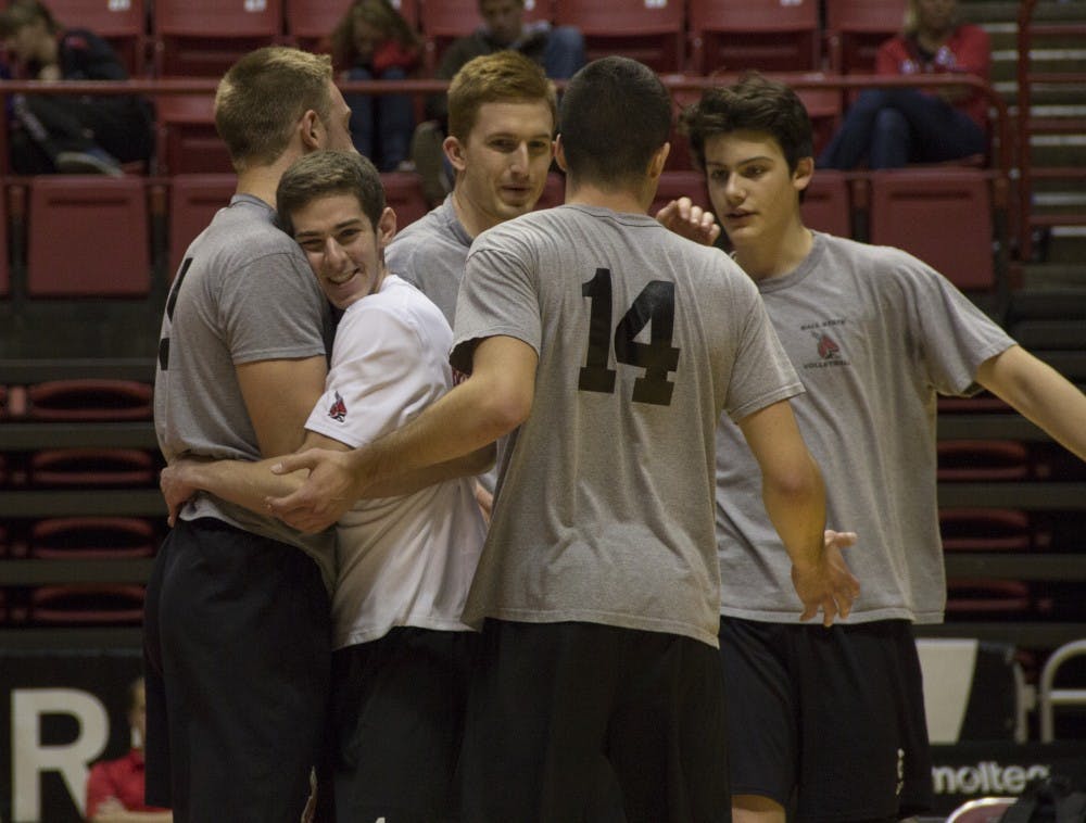 Ball State's men's volleyball team celebrates after winning a point during the match against Loyola on Nov. 10. Ball State won the match 3-2. DN PHOTO EMMA ROGERS
