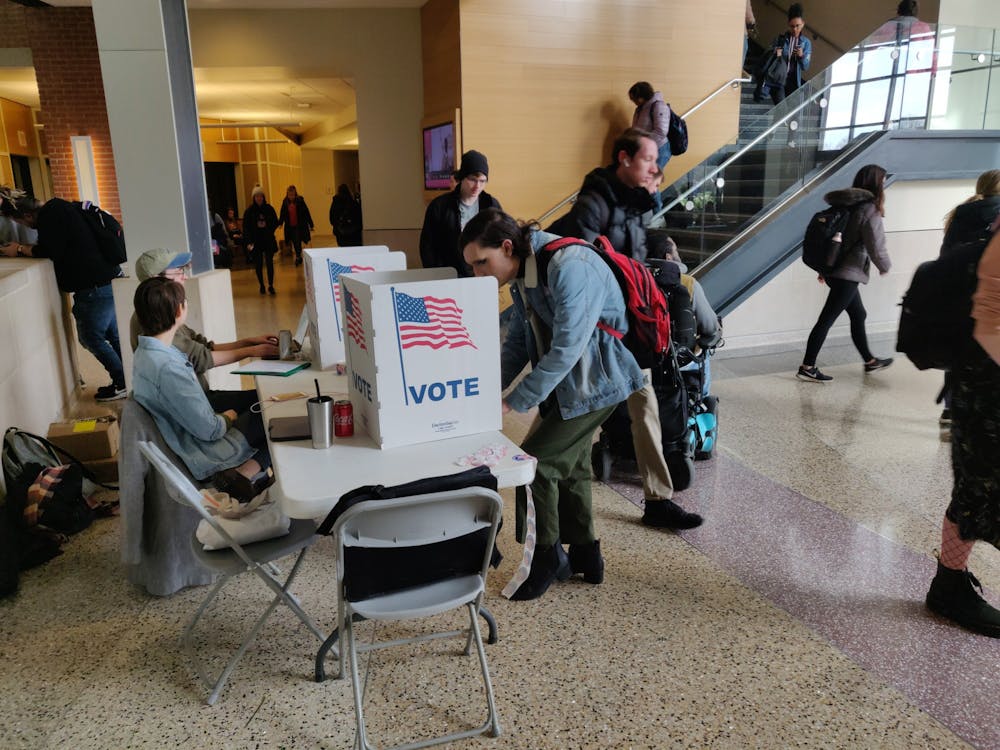 <p>A Ball State student votes at the on-campus polling location Feb. 17, 2020, at the Letterman Building's lobby. Voting for the Student Government Association's 2020 runoff election lasts from Feb. 24-25, 2020. <strong>Rohith Rao, DN</strong></p>
