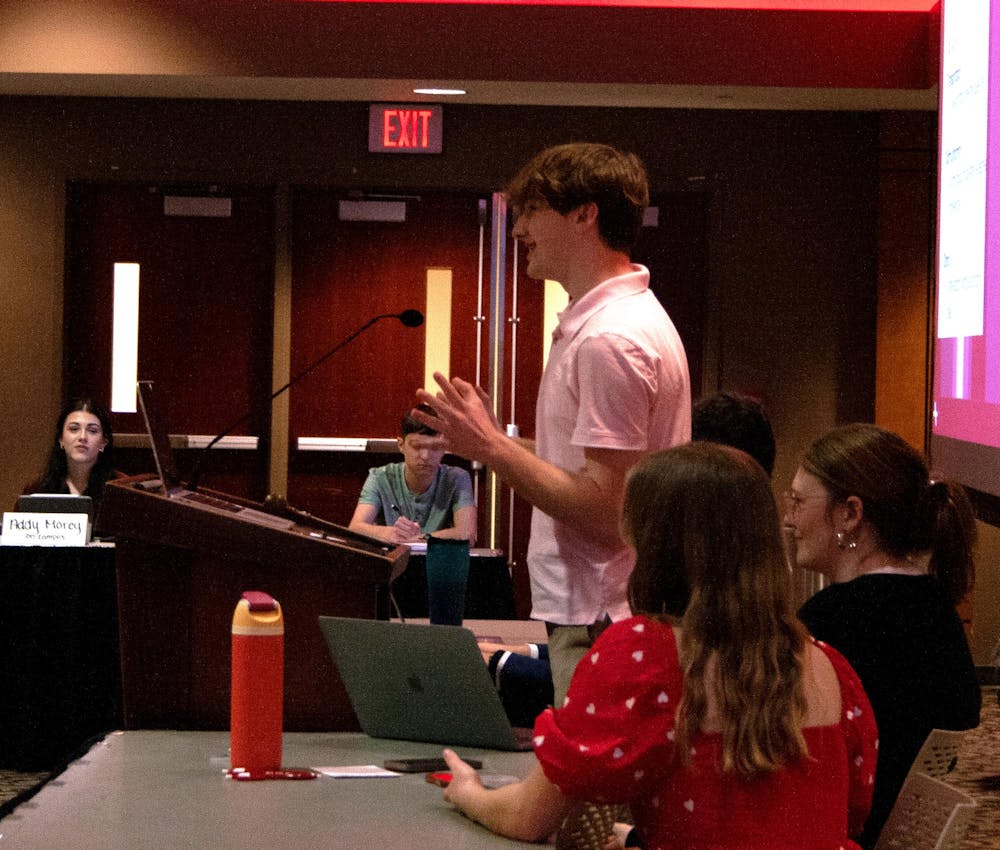 First-year Geoology major Tyler Gatliff presents in front of Ball State University's Student Government Association in the L.A. Pittenger Student Center Feb. 12. Gatliff applied to be a senator for the At-Large Caucus. (Hannah Amos, DN)