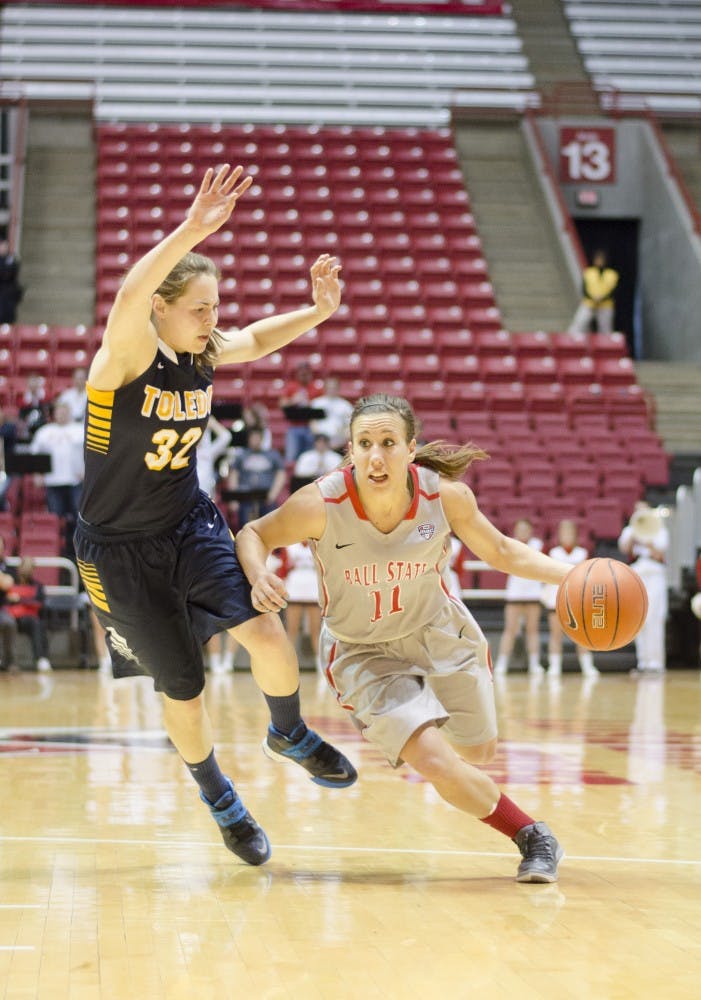 Senior guard Brandy Woody drives the ball past a Toledo player in the second half March 8 at Worthen Arena. Woody scored 11 points in the game. DN PHOTO BREANNA DAUGHERTY 